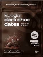 Bougie Dark Choc Dates chocolate snack packaging in a glossy dark brown pouch with white text and a photo of pitted dates splashing on the front, labeled 'With a hint of cherry' and 'Clean Snack'.